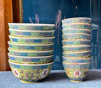 Stacked overview of 18 porcelain bowls showing their traditional Chinese decorative patterns on yellow and blue backgrounds with character markings.
