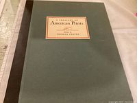 Front cover of the green hardcover book with title label