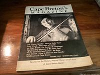 Front cover of Cape Breton's Magazine Number One 1972 showing a man playing a fiddle and listing featured articles about Cape Breton culture and history.