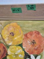Close-up of the oil painting showing yellow and orange flowers with texture and 20x16 size label.