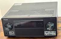 Front view of receiver showing knobs and display