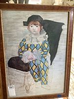 Framed art print of 'Paul as Harlequin' by Pablo Picasso, showing the full front view of the piece with frame.