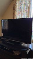 Front view of 36 inch Panasonic Viera LCD TV showing screen and stand