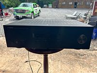 Front view of Yamaha R-5201 receiver showing front controls and volume knob.