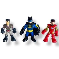 All three small PVC figures: Imaginext Batman, Playskool Dr. Morocco and Marvel Iron Man Tony Stark shown side by side on a white background.