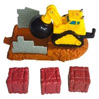 Fisher-Price GeoTrax wrecking set showing construction platform base with gray brick walls and three red bale blocks.