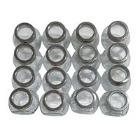 Top view of 16 clear glass spice jars arranged in 4 rows showing jar openings with chrome rims and glass lids.