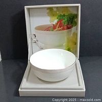 White bone china bowl with pink and gold trim displayed inside original Mikasa gift box with printed interior image of salad.