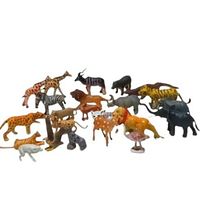 Full lot view showing 23 various small safari animal figurines including elephant, giraffe, lion, tiger, zebra, hippo, and rhino.