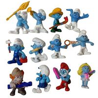 Group image of 12 Smurf figurines in various poses with accessories such as tools, musical instruments, and gift boxes. Figures are blue, wearing white hats and pants, except Papa Smurf with red hat and pants.