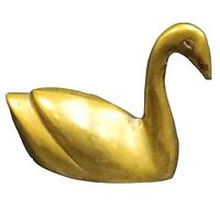 Side view of vintage brass swan figurine paperweight showing smooth neck and wing details.