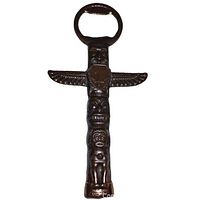 Full view of the vintage Kwakiuti totem pole Thunderbird bottle opener showing the entire figure with wings and metal opener.