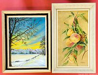 Both framed oil paintings side by side against a red background.