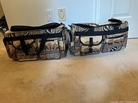 Both safari print duffel bags placed side by side on the floor showing overall shape and pattern