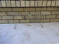 Front view of sculpture on stand