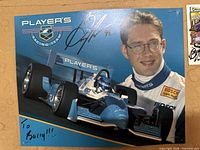 Signed Greg Moore Player's Racing Team racing poster with image of Greg Moore and race car, signed with dedication.