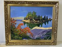 Frontal view of the oil painting showing vibrant landscape and ornate gold frame.