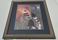 Frontal close-up of the framed art print showing the detailed composition and frame design.