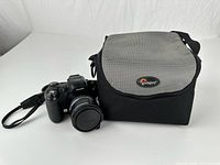 Camera and bag side by side