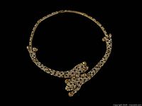 Entire choker necklace laid flat showing overall design