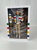 Front view of boxed limited edition HBC Stripes Barbie doll