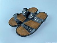 Top view of Naot sandals showing straps, footbed, overall style