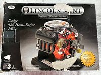 Front of opened Testors Lincoln Mint box showing kit title and engine image