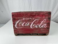Front view showing faded red paint and Coca-Cola logo