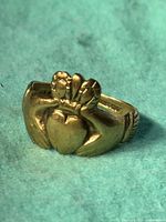 Front view of ring on blue background