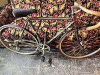 Side view of the 1970's Norco Monterey SL racing bike showing the alloy frame, gear system, and tires.