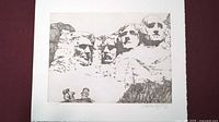 Full view of etching showing Mount Rushmore image