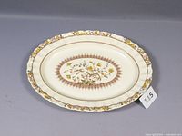 Full view of the oval Copeland Spode Buttercup platter showing entire floral pattern and decorative edge