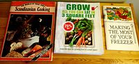 Three cookbooks together showing front covers: Scandinavian Cooking, Grow All You Can Eat in 3 Square Feet, Making the Most of Your Freezer.