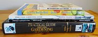 Stack of 5 gardening and nature books showing titles and spine details.