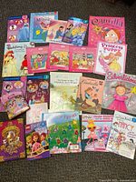 Overview of 22 children's books themed around princesses and fairy tales from Disney, Scholastic, and other publishers. Colorful covers featuring characters like Cinderella and Ariel.