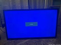 Element 32 inch TV screen displaying a blue background with 'No Signal' message.
