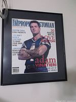 Framed 2004 magazine cover featuring Adam Vinatieri in a Patriots jersey, with signature and personalized inscription.
