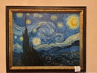 Frontal view of the framed canvas print depicting Starry Night with visible details of the painting and frame.