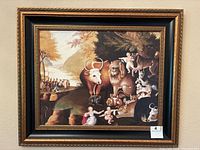 Full view of the framed print showing animals and cherubs in a natural setting.
