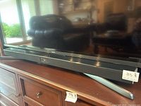 Samsung soundbar showing full length and front design.