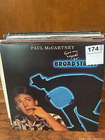 Stacked view showing Paul McCartney cover on top and partial stack beneath
