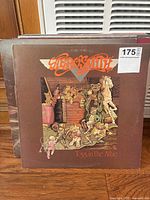 Single Aerosmith “Toys in the Attic” album front cover