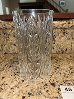 Full view of the Waterford crystal candle holder with detailed cut crystal pattern and open ends.