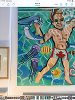 Close-up of the painting showing the muscular male figure with underwater animals including dolphins and jellyfish.