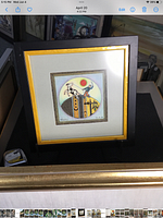Photo of framed colorful laser copy artwork with ink and watercolor by H. Hickley, showing entire frame and mat with visible artwork.