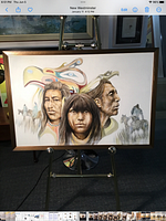 Full view of framed painting on easel