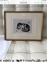 Full view of the framed watercolour featuring a cat and bug.