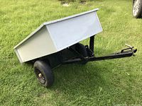 Side view of entire cart showing box mounted on frame with hitch