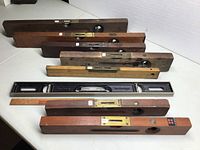 Full view of all seven levels arranged on a table showing variety in materials and size.