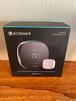 Front of Ecobee4 retail box showing product and sensor